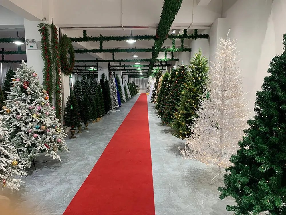 Christmasever showroom lined with artificial Christmas trees